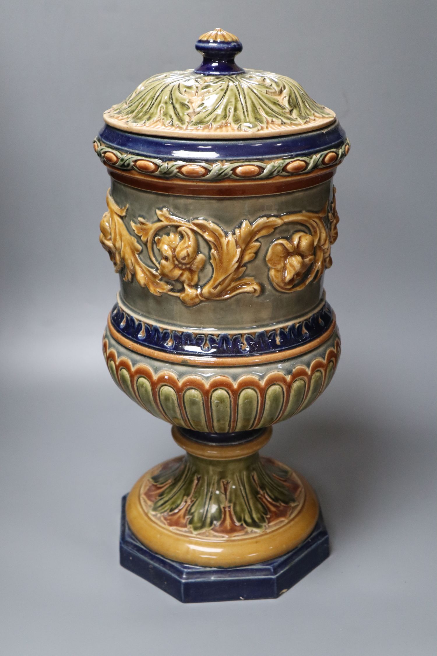 A 19th century glazed stoneware water filter, with cover, 48cm